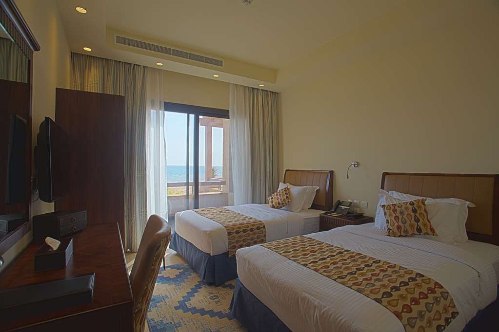 Golden Tulip Sharma Resort Værelse billede